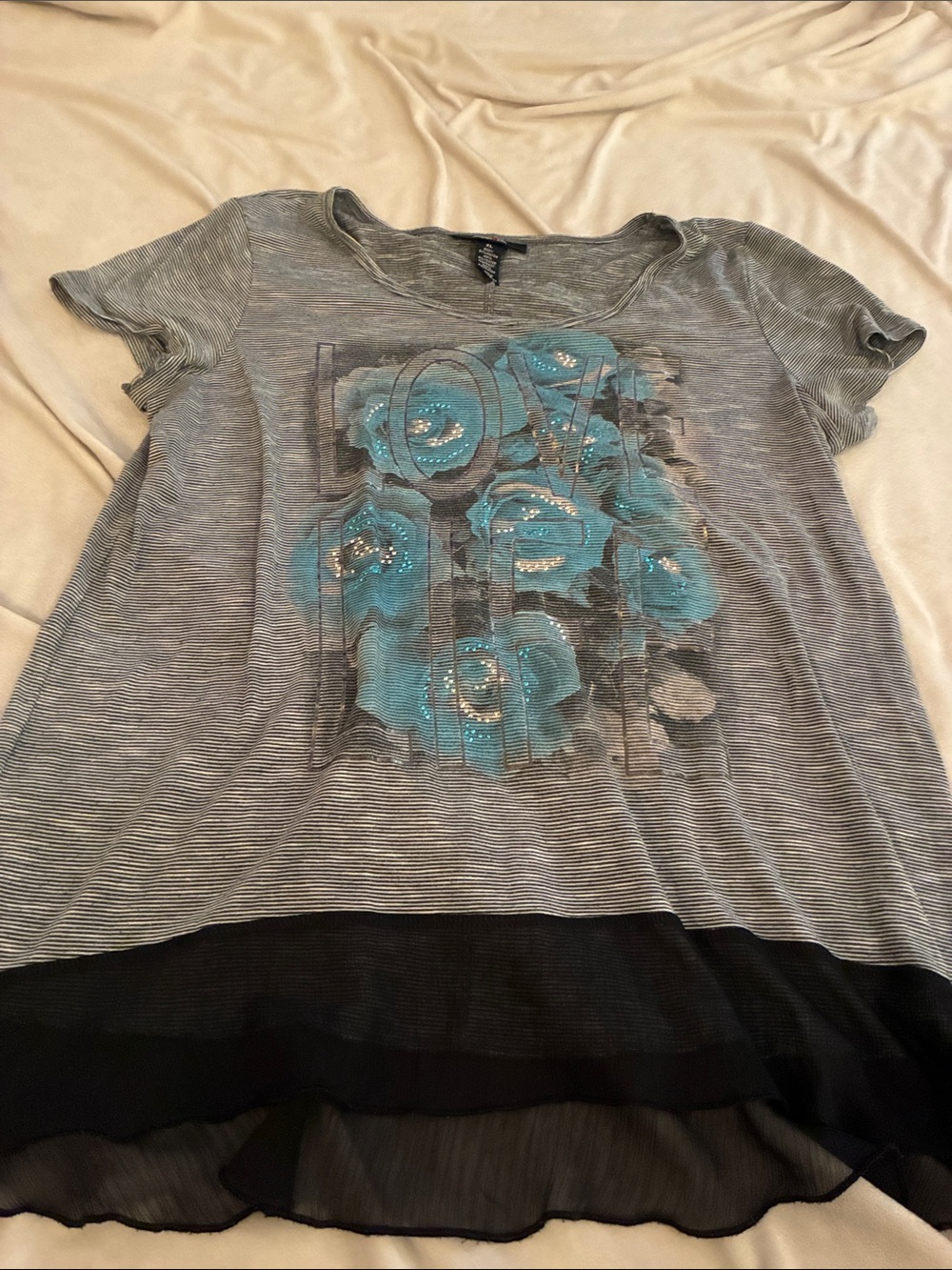 George Gray Short Sleeve Tee with Blue Floral Sequin Accent and Black Hem